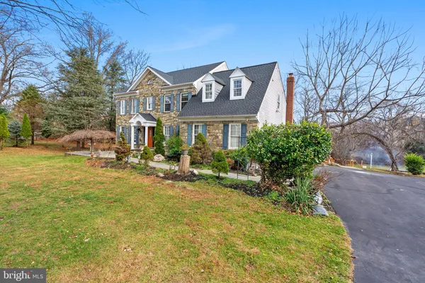 a view of a street with a building in the background