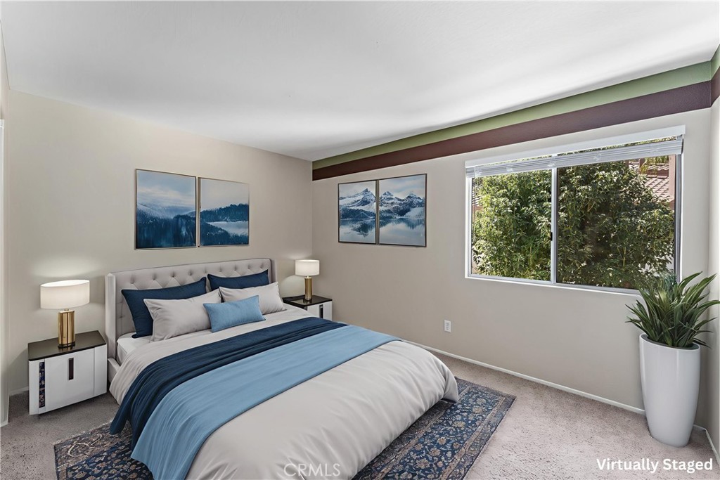 4150 San Ramon Drive Corona, CA 92882 - Photo 16 of 30 a bedroom with a large bed and a potted plant