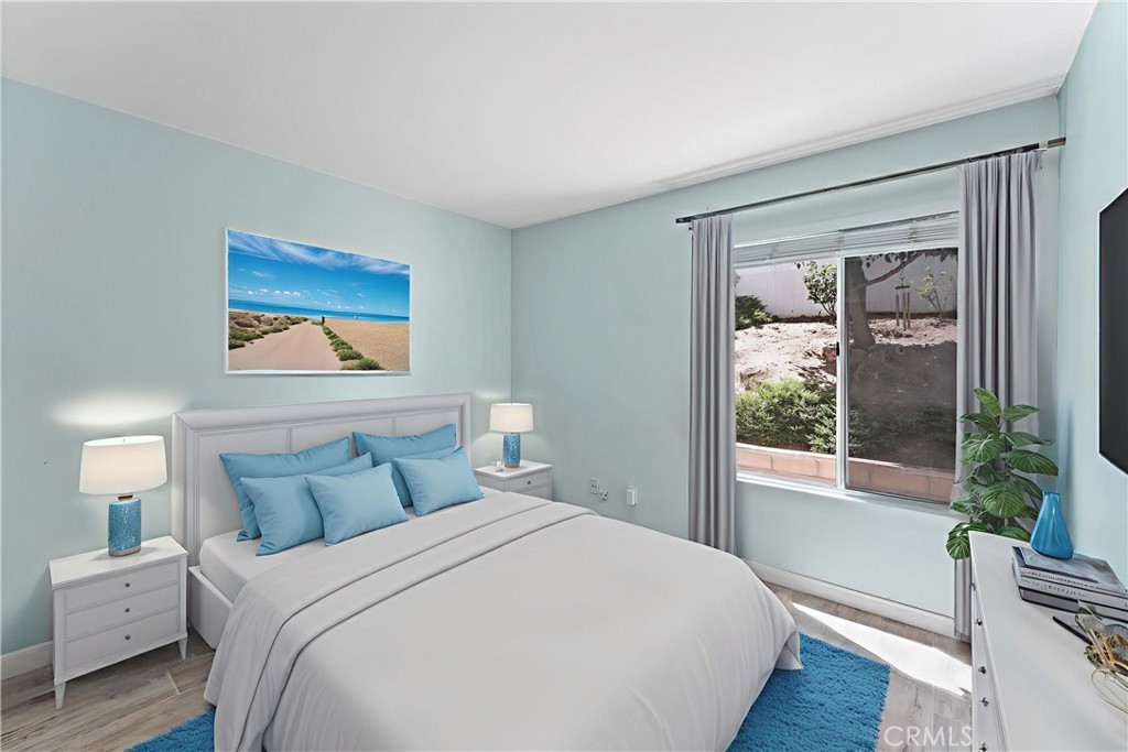 4150 San Ramon Drive Corona, CA 92882 - Photo 20 of 30 a bedroom with a large bed and a window