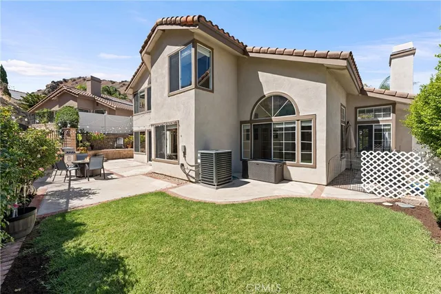 a view of a house with a garden