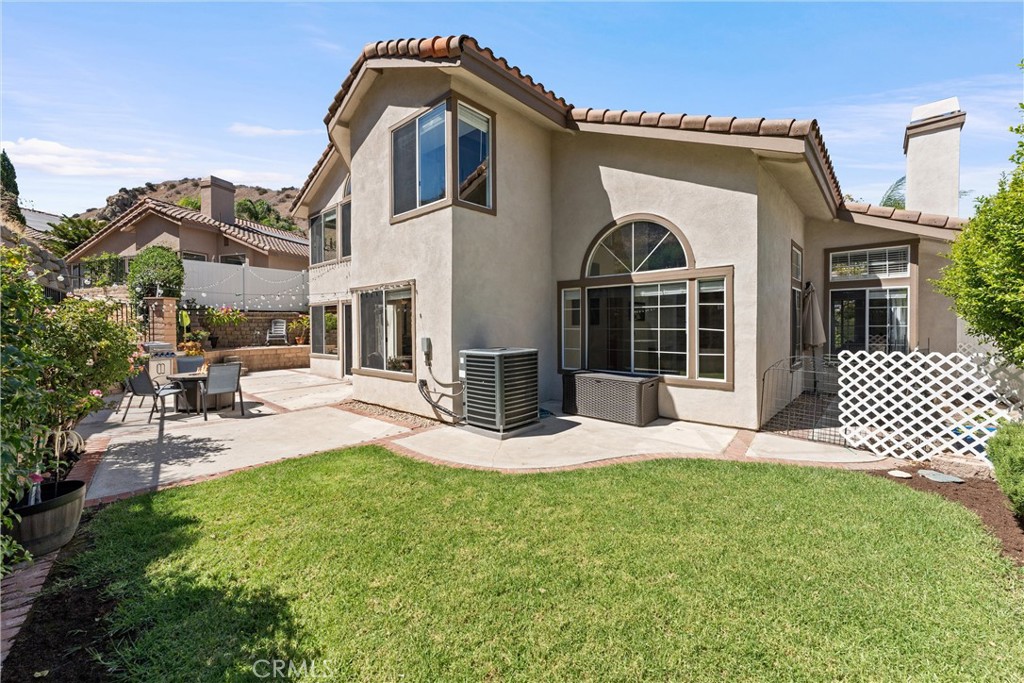4150 San Ramon Drive Corona, CA 92882 - Photo 23 of 30 a view of a house with a garden
