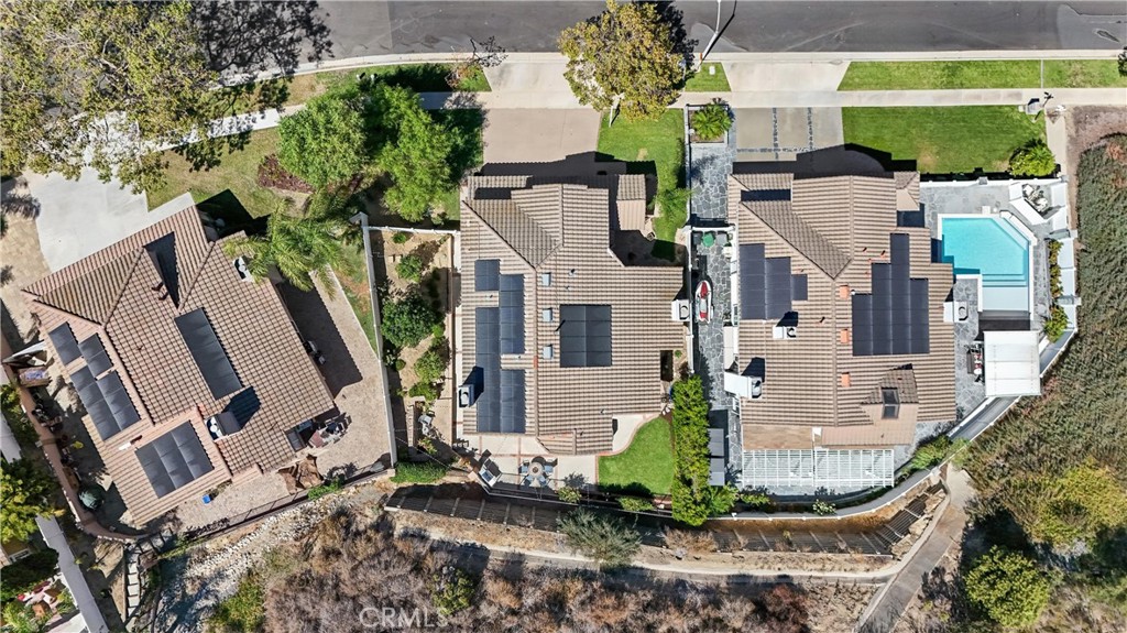 4150 San Ramon Drive Corona, CA 92882 - Photo 29 of 30 a aerial view of a house with a yard and potted plants