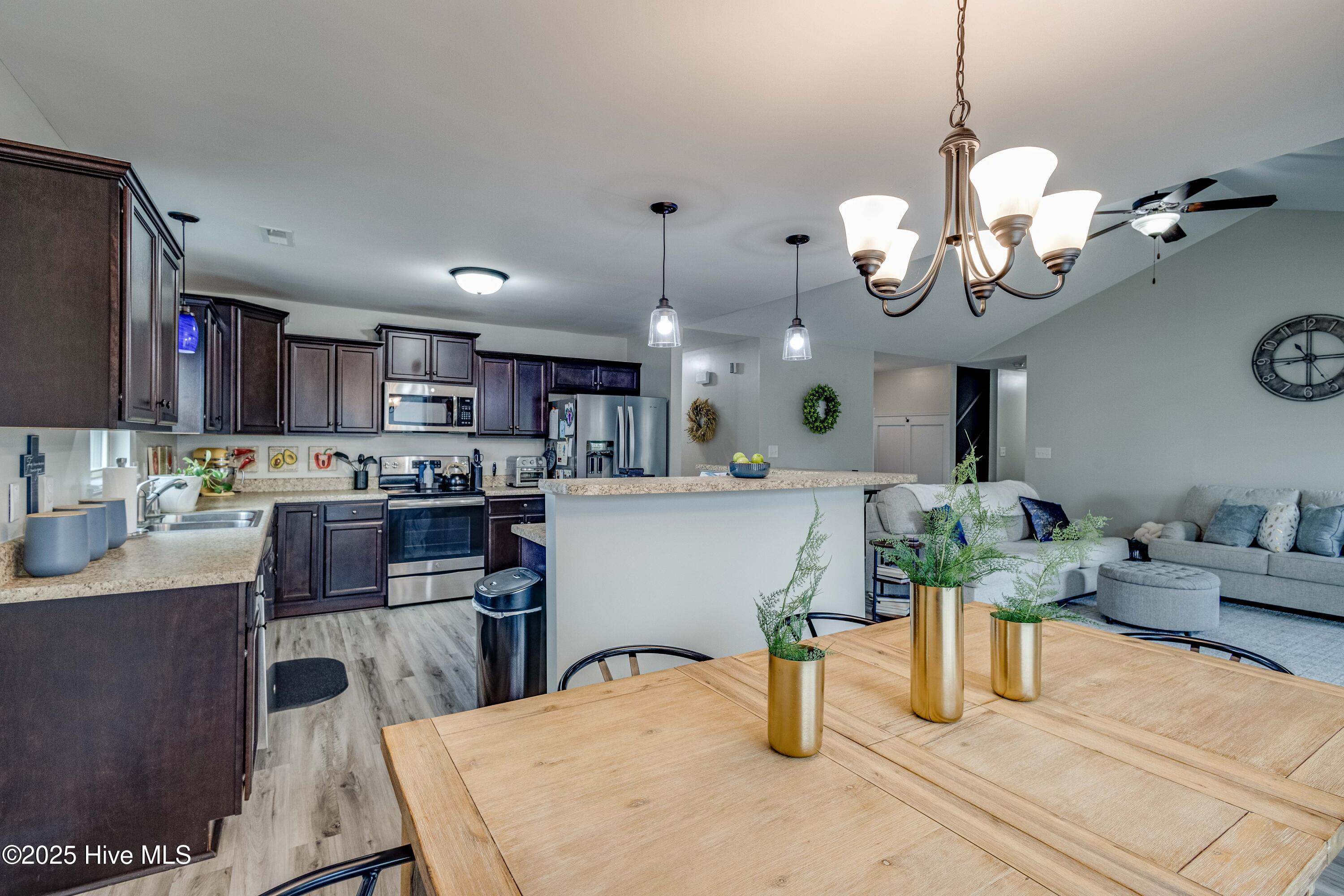208 Peaceful Lane Hubert, NC 28539 - Photo 10 of 38 Dining Room & Kitchen