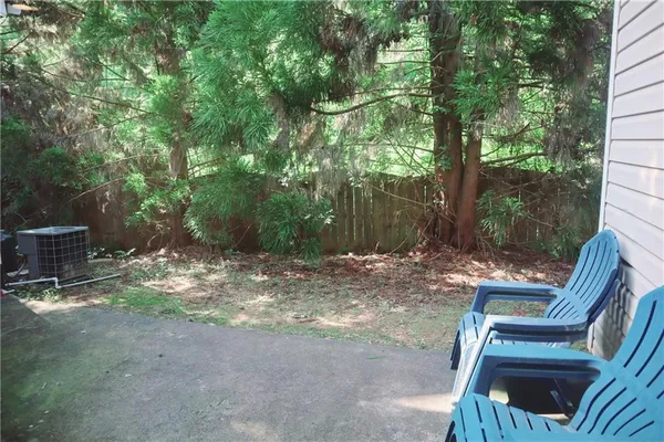 a front view of a house with street view