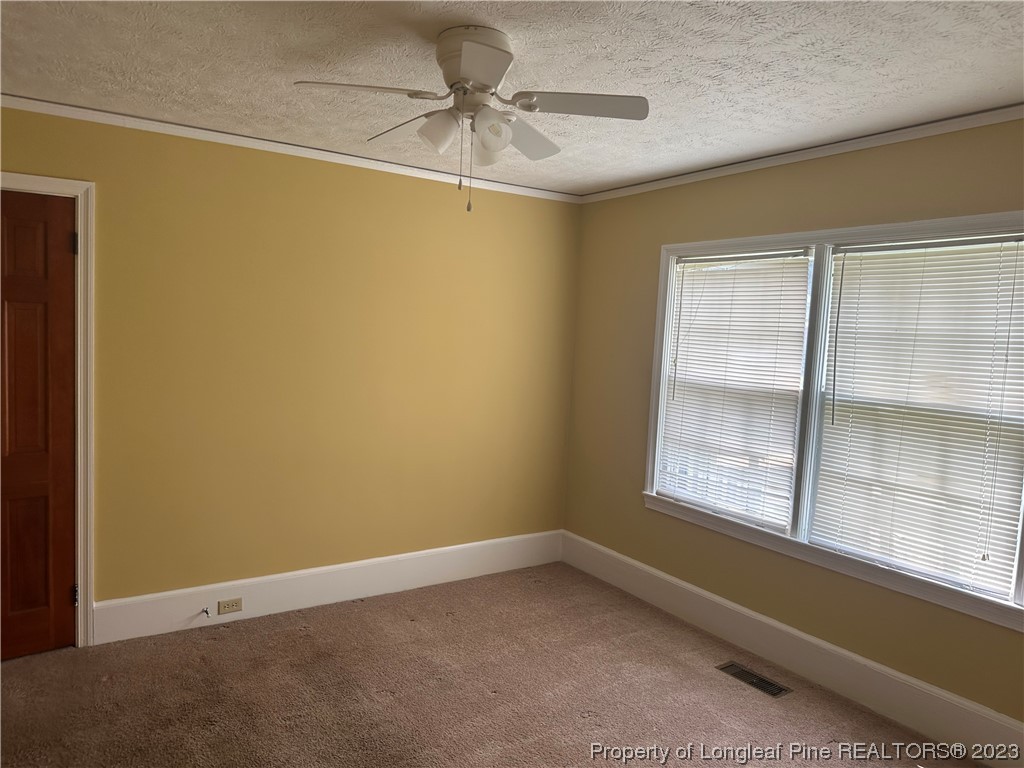 202 North Bethel Road Raeford, NC 28376 - Photo 11 of 15 a view of an empty room with a window