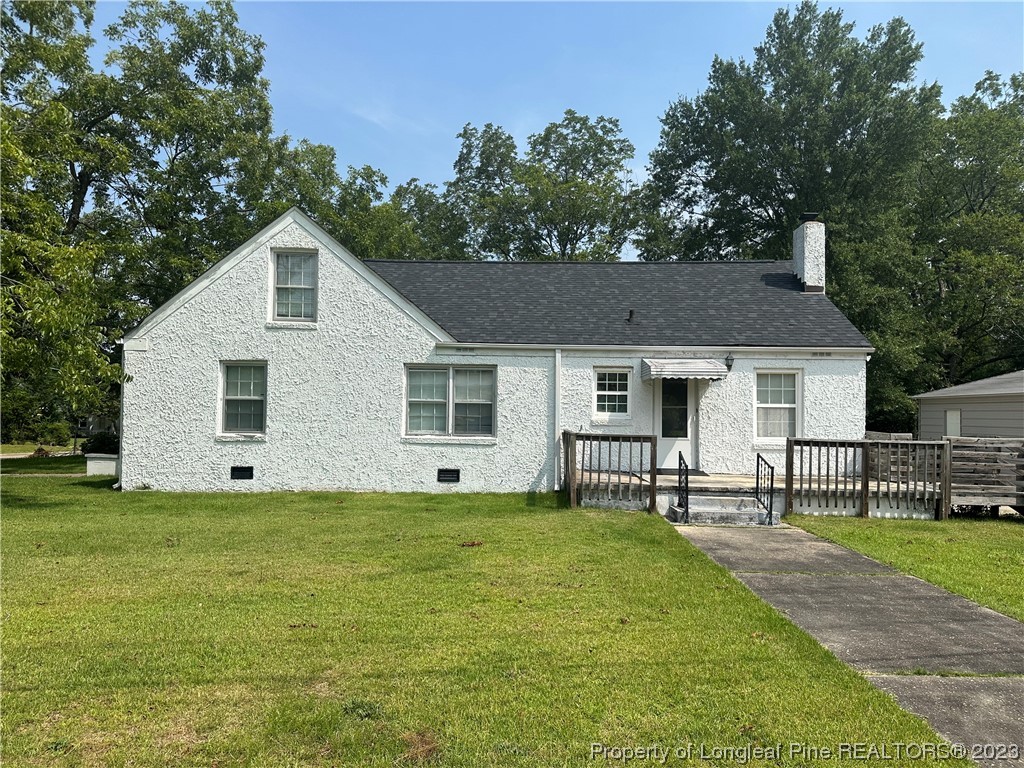 202 North Bethel Road Raeford, NC 28376 - Photo 3 of 15 a view of a house with a yard