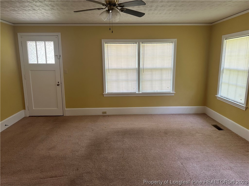 202 North Bethel Road Raeford, NC 28376 - Photo 5 of 15 an empty room with a window