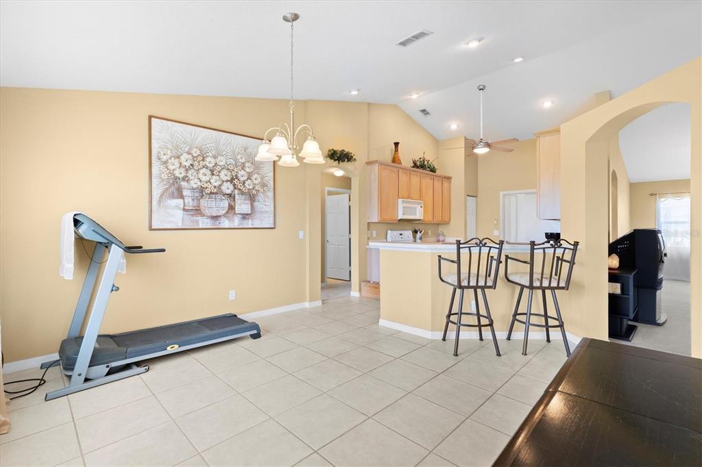 17083 Southeast 115th Terrace Road Summerfield, FL 34491 - Photo 18 of 43 a view of a dining room with furniture