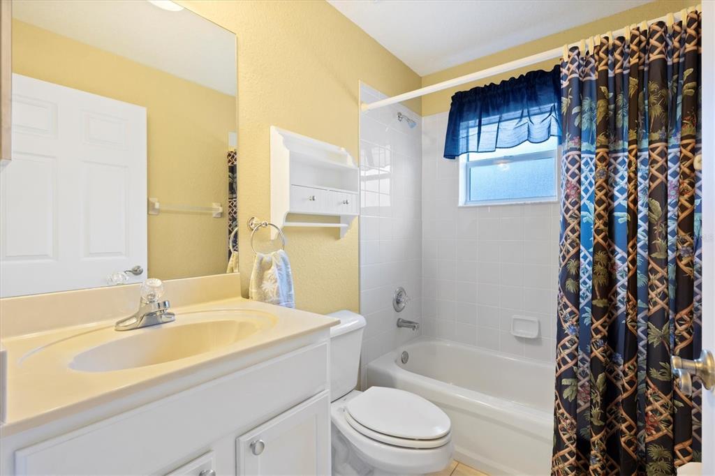 17083 Southeast 115th Terrace Road Summerfield, FL 34491 - Photo 26 of 43 a bathroom with a sink toilet and shower