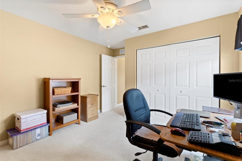 17083 Southeast 115th Terrace Road Summerfield, FL 34491 - Photo 28 of 43 a workspace with furniture and chandelier