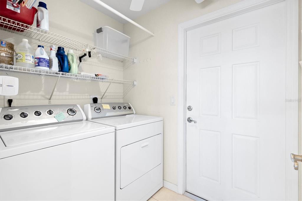 17083 Southeast 115th Terrace Road Summerfield, FL 34491 - Photo 31 of 43 a utility room with dryer and washer