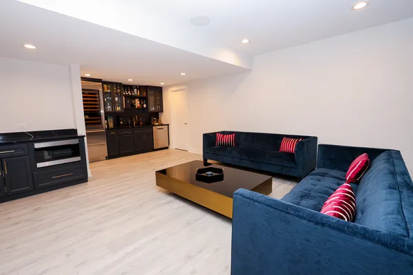 a room with furniture and flat screen tv