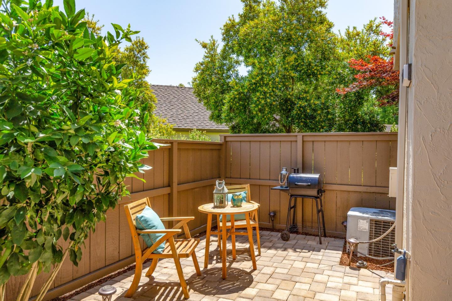 2071 Foxhall Loop San Jose, CA 95125 - Photo 3 of 17 a backyard of a house with table and chairs
