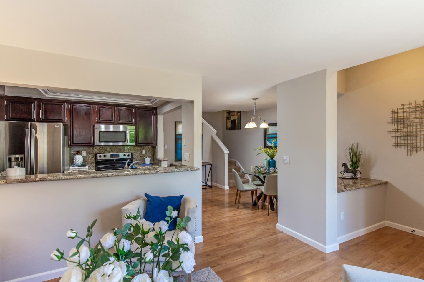2071 Foxhall Loop San Jose, CA 95125 - Photo 6 of 17 a living room with furniture and a flat screen tv