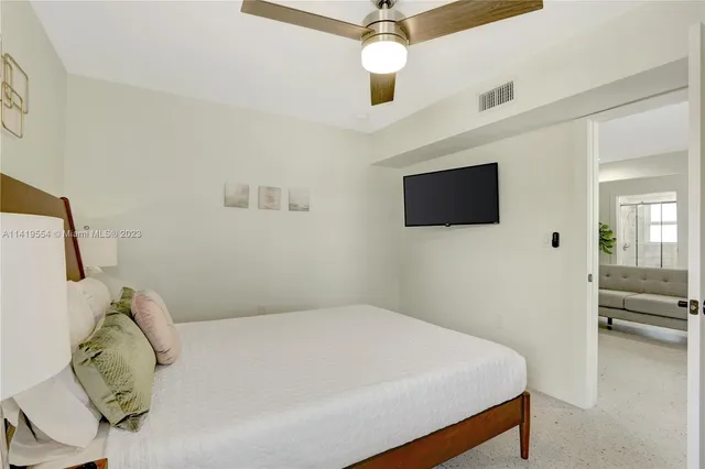 a room with furniture and a window