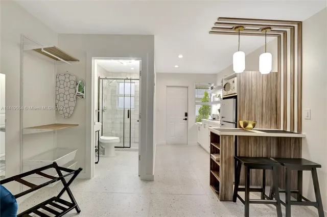 a room with furniture and a window