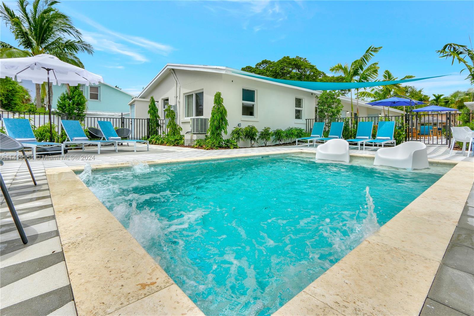 Palm Trail Delray Beach, FL 33483 - Photo 3 of 55 a view of a house with backyard and sitting area