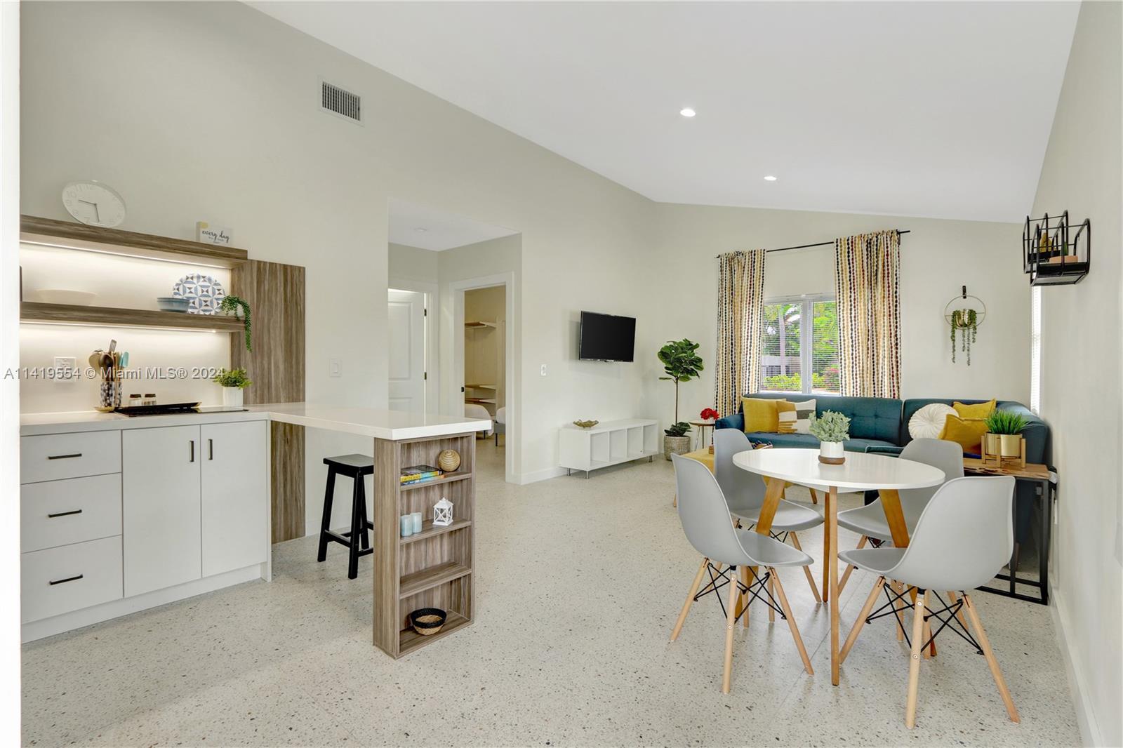 Palm Trail Delray Beach, FL 33483 - Photo 51 of 55 a view of a livingroom with furniture and window