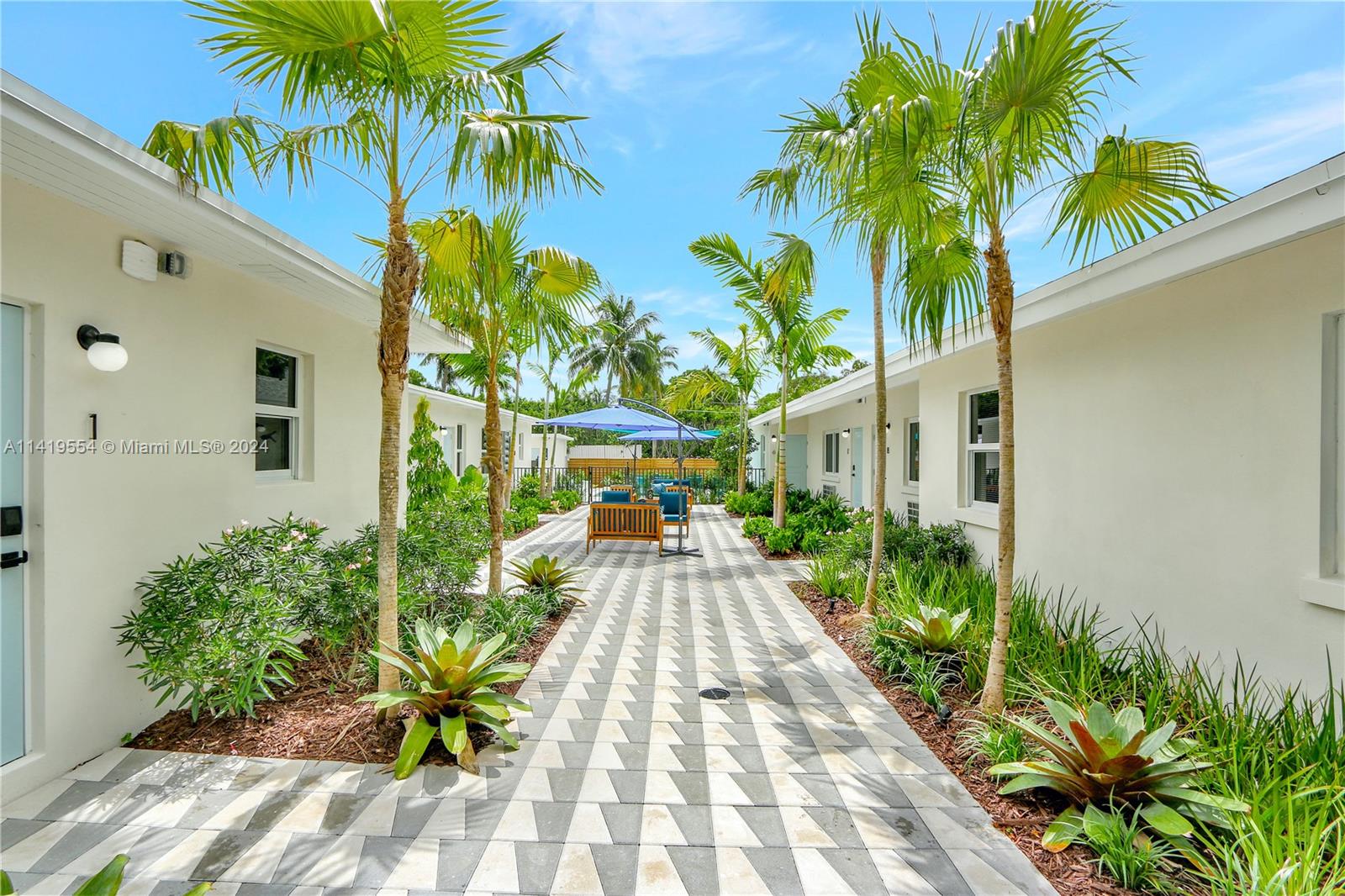 Palm Trail Delray Beach, FL 33483 - Photo 6 of 55 a view of a backyard with a garden