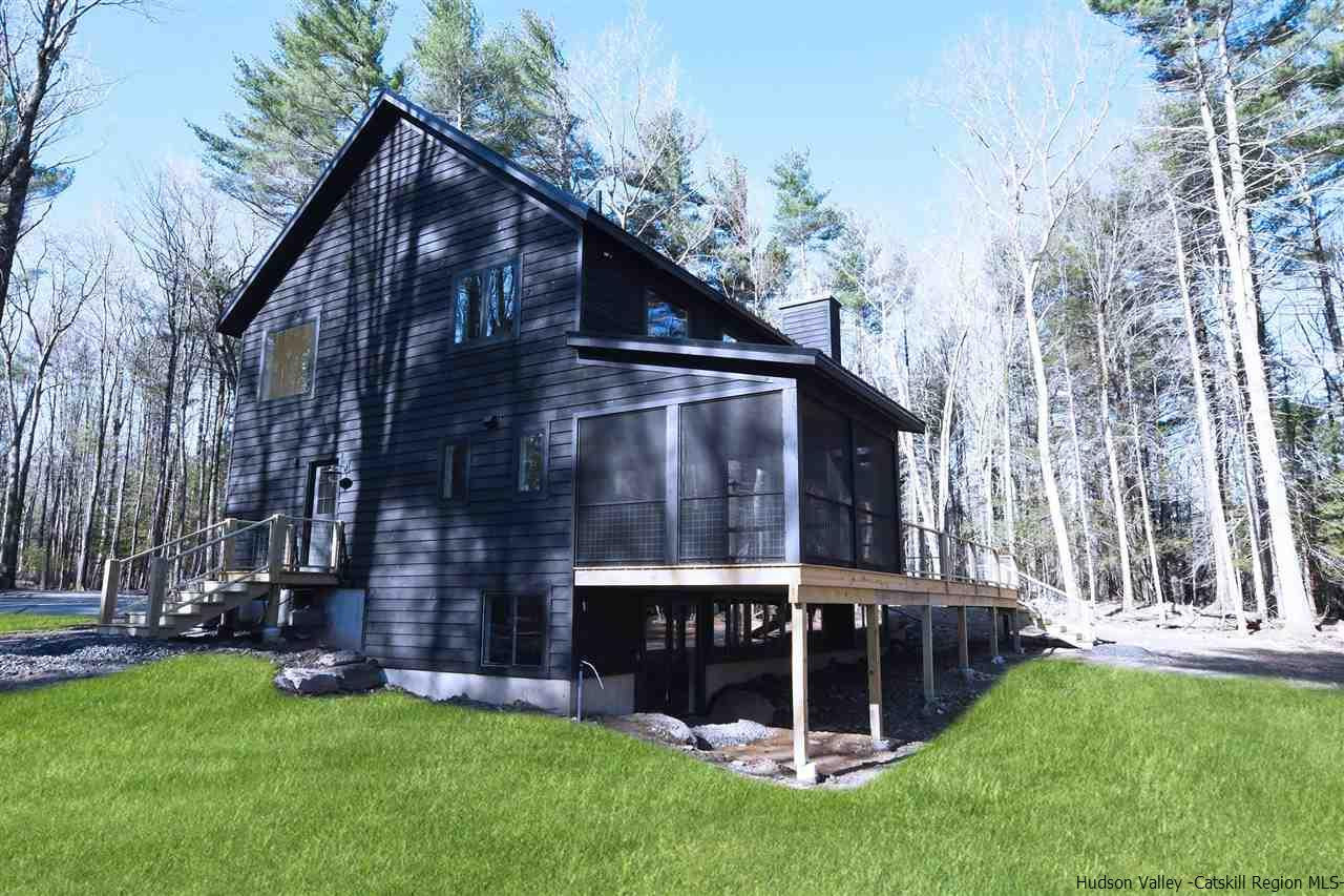 44 Krom Road Olivebridge, NY 12461 - Photo 27 of 33 a view of a house with a yard and wooden fence