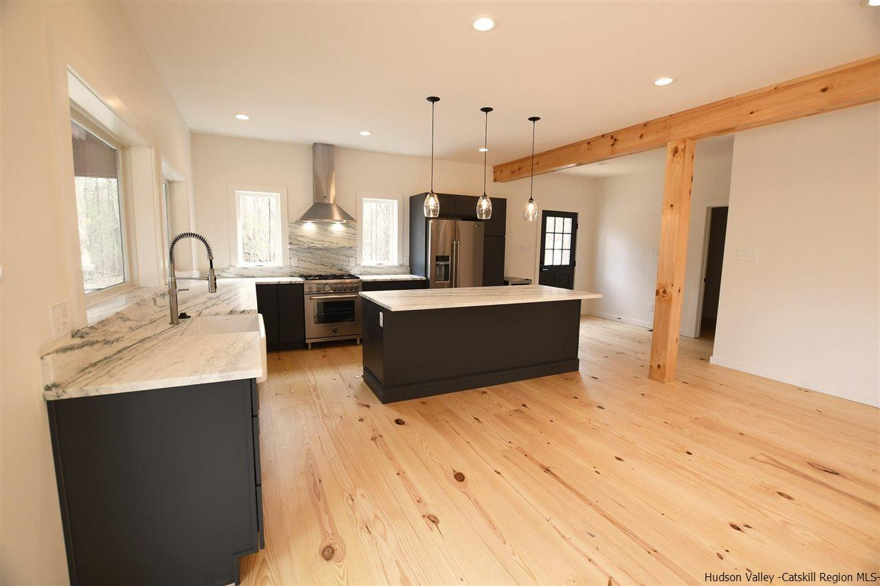 44 Krom Road Olivebridge, NY 12461 - Photo 6 of 33 a large kitchen with kitchen island a sink stainless steel appliances and cabinets