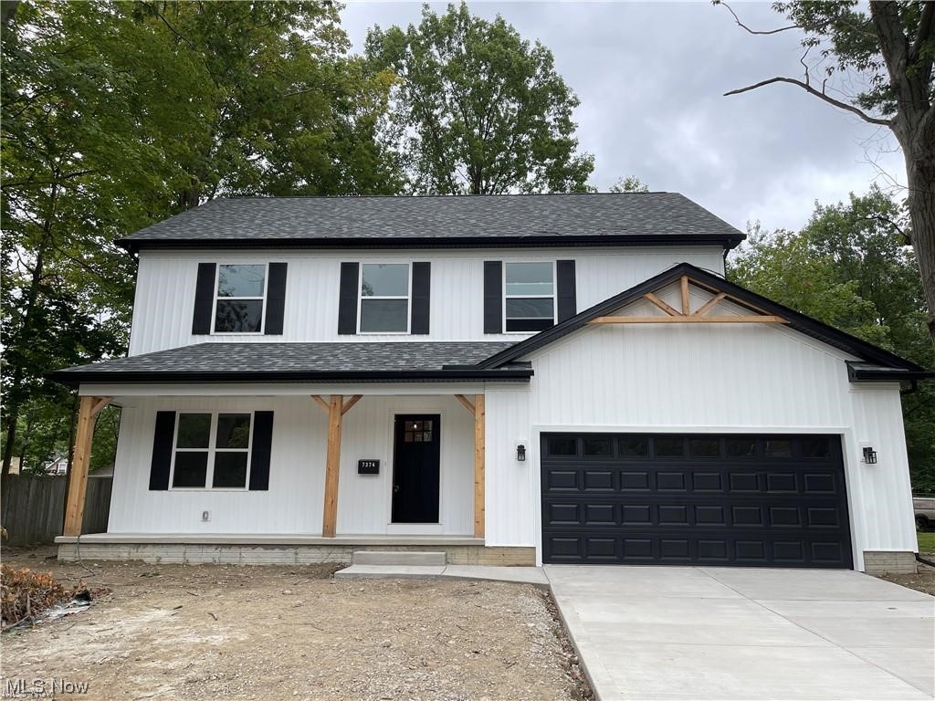 7374 Crossfield Road Mentor, OH 44060 - Photo 1 of 35 Modern farmhouse style home with garage and a porch