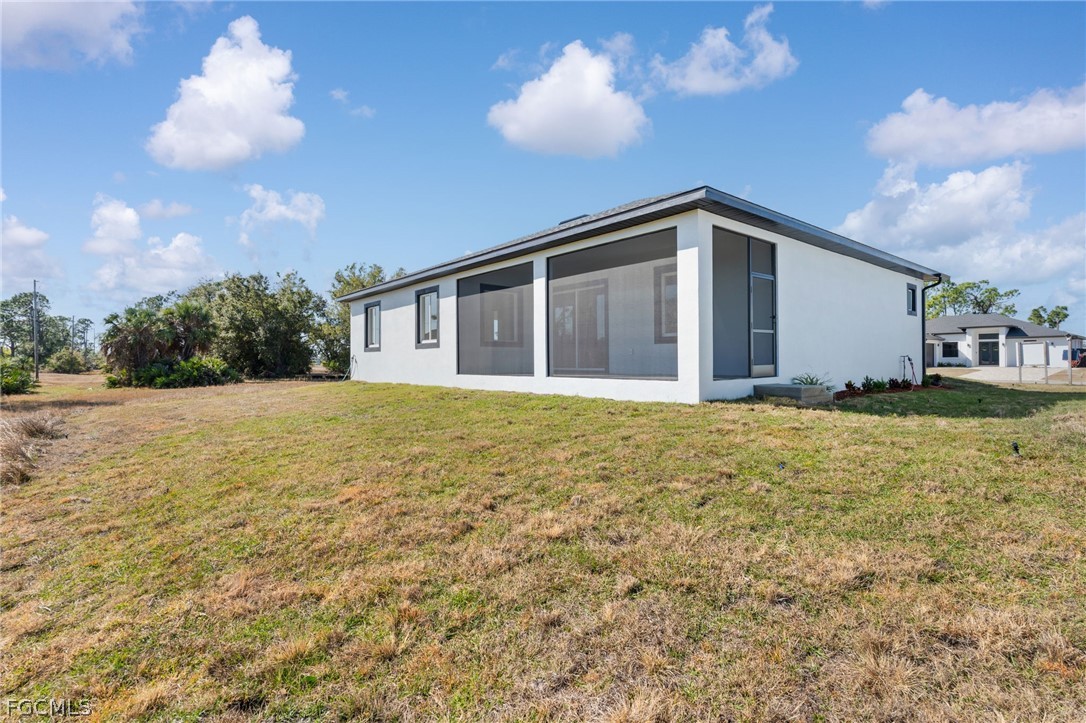 95 Brig Circle East Placida, FL 33946 - Photo 22 of 25 a view of an house with backyard space