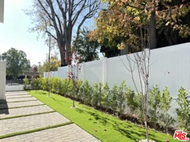 a view of a garden with pathway
