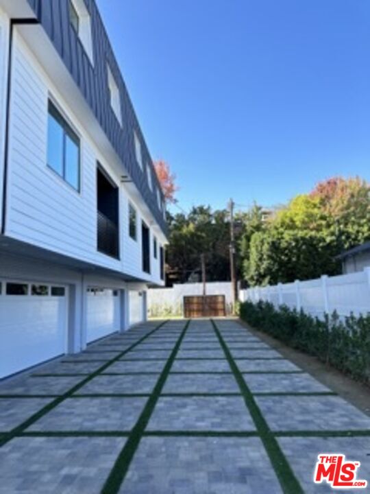 4805 Matilija Avenue Sherman Oaks, CA 91423 - Photo 3 of 22 a view of a house with a yard