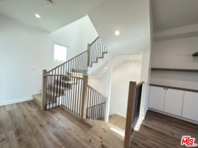 a view of entryway with wooden floor