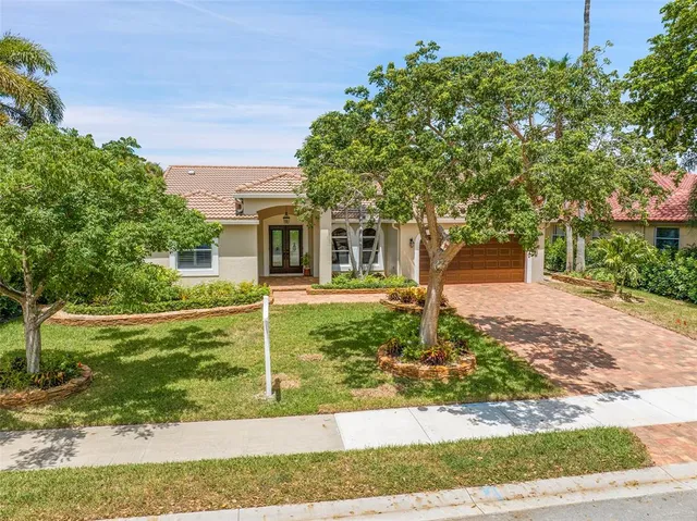 front view of a house with a yard