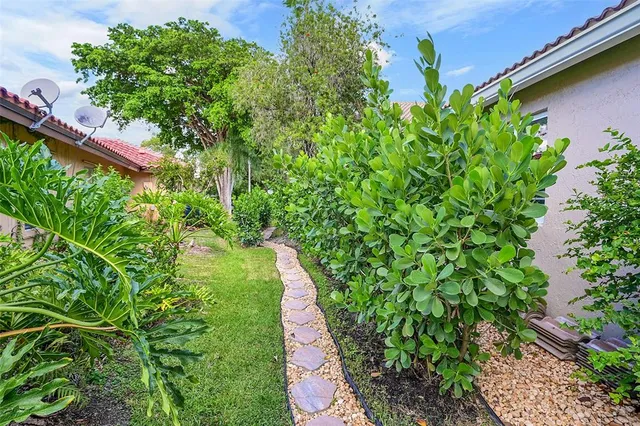a balcony with lots of green space