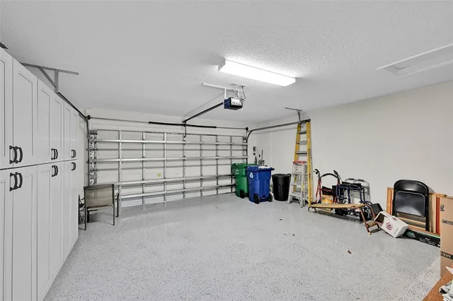 a view of a livingroom with furniture and a ceiling fan
