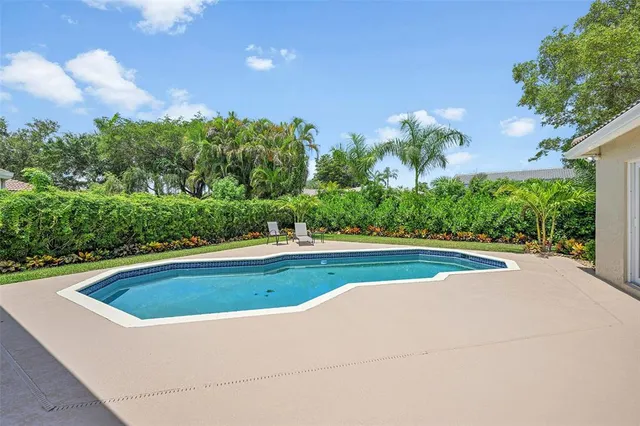 a view of outdoor space yard and swimming pool