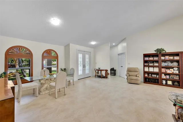 a view of a livingroom with furniture and white walls