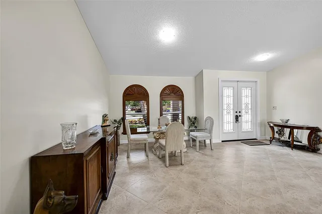 a living room with fireplace furniture and a view of living room
