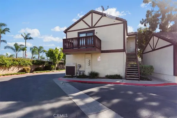 a view of a house with a street
