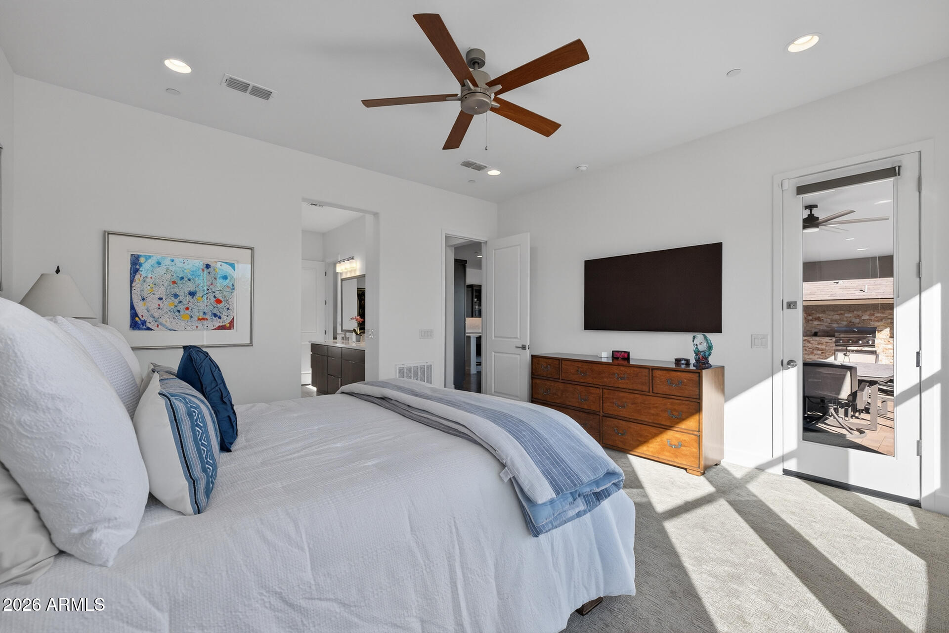 18205 East Juniper Oaks Drive Rio Verde, AZ 85263 - Photo 22 of 77 a bedroom with a bed and a flat screen tv