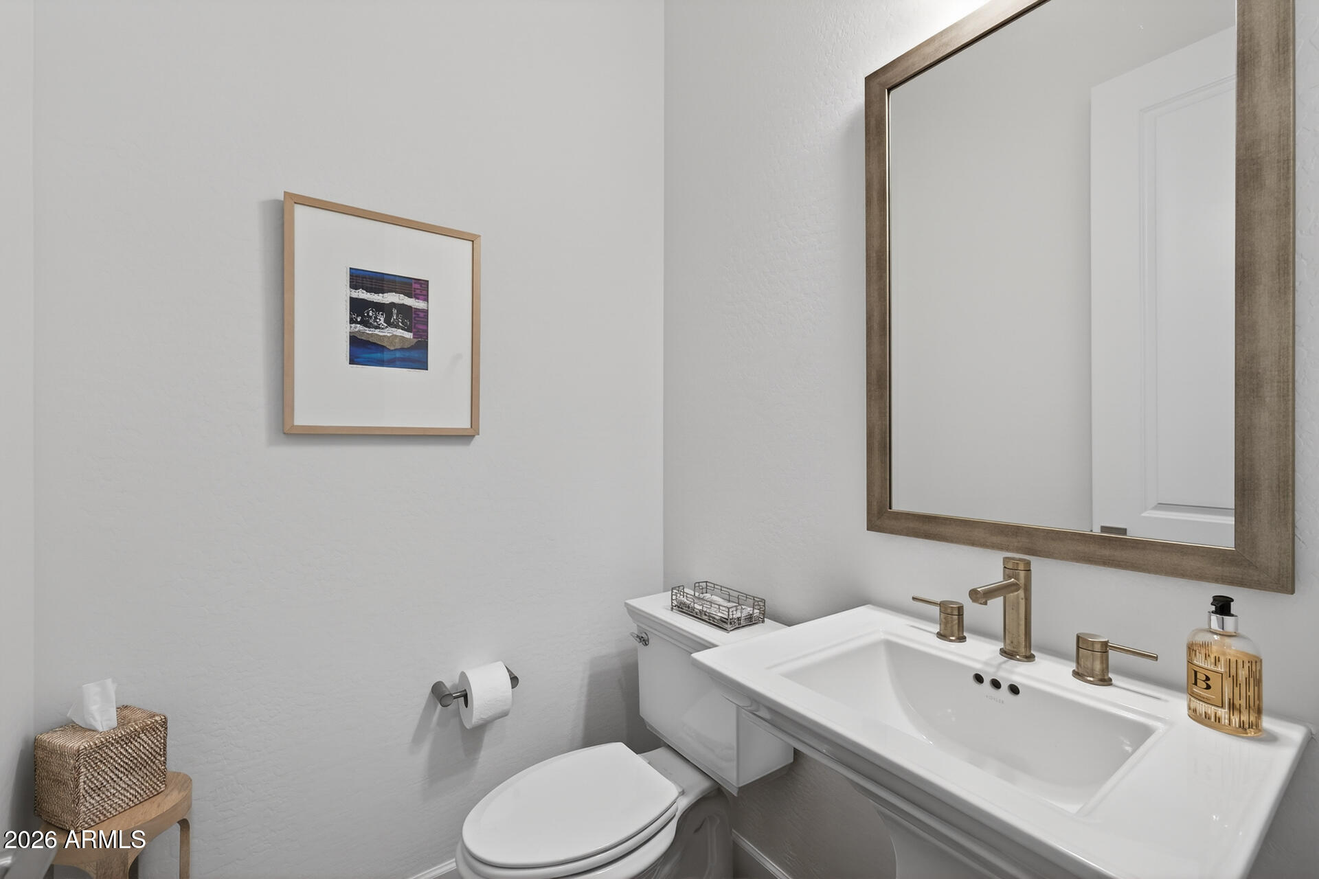 18205 East Juniper Oaks Drive Rio Verde, AZ 85263 - Photo 32 of 77 a bathroom with a toilet sink and mirror