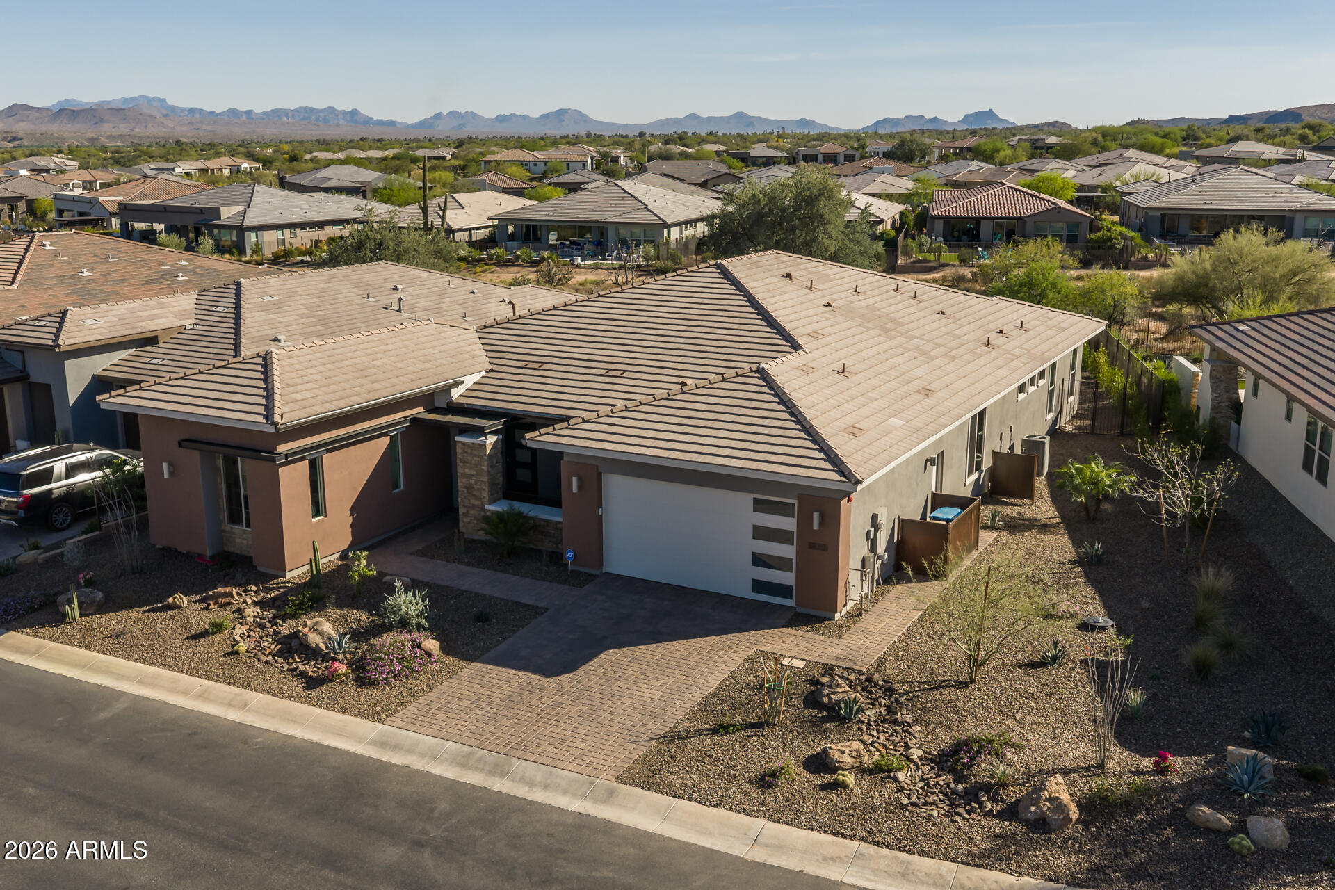 18205 East Juniper Oaks Drive Rio Verde, AZ 85263 - Photo 4 of 77 an aerial view of a house with a mountain view