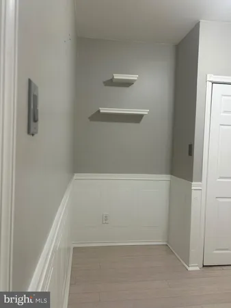 a view of small space with racks on the wall
