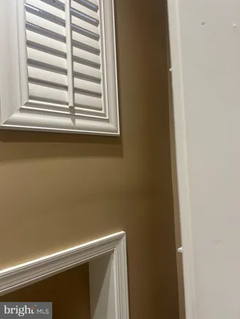 a view of a window in an empty room
