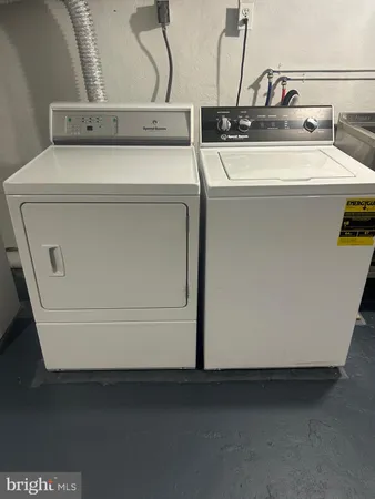 a utility room with washer and dryer