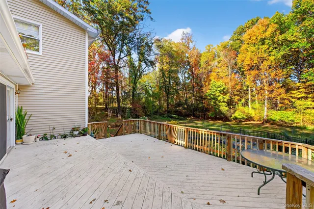 a view of a hallway view with staircase