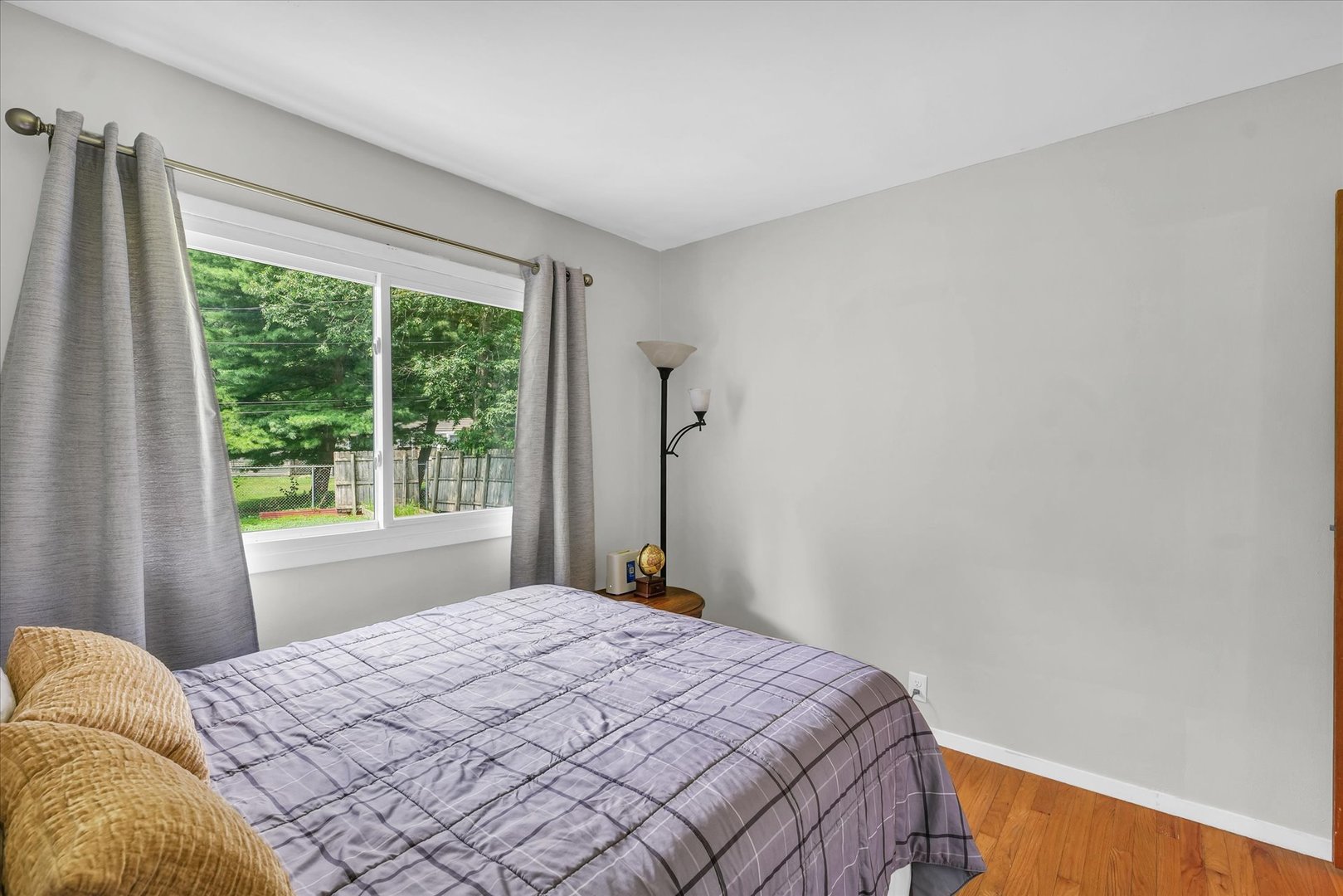 1617 Cornell Drive Champaign, IL 61821 - Photo 20 of 31 a bedroom with a bed and a window