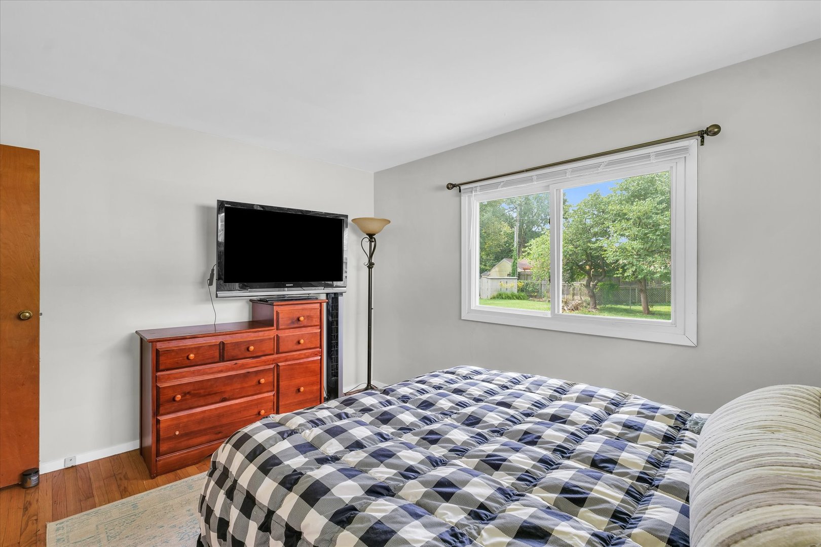 1617 Cornell Drive Champaign, IL 61821 - Photo 23 of 31 a bedroom with a bed and television