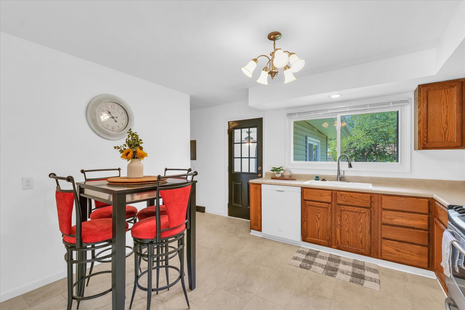 1617 Cornell Drive Champaign, IL 61821 - Photo 8 of 31 a dining room with a table and chairs