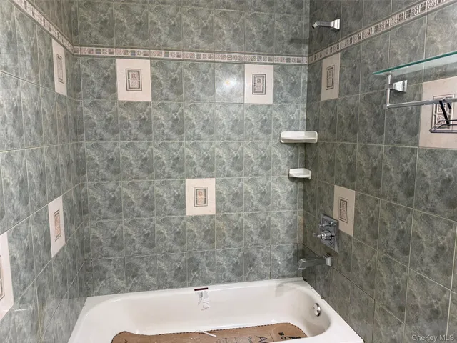 a bathroom with a sink and a bathtub