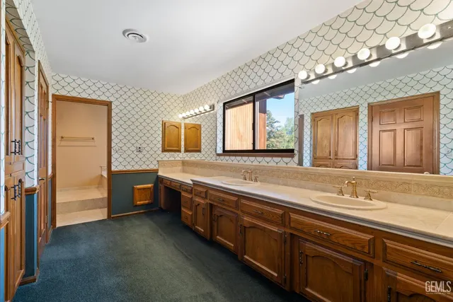 a view of a swimming pool and a yard