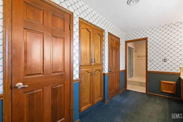 a view of a lake with a yard